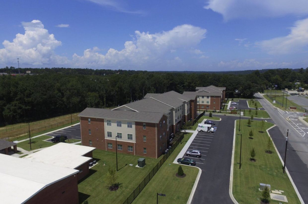 Drone view of apartment buildings.