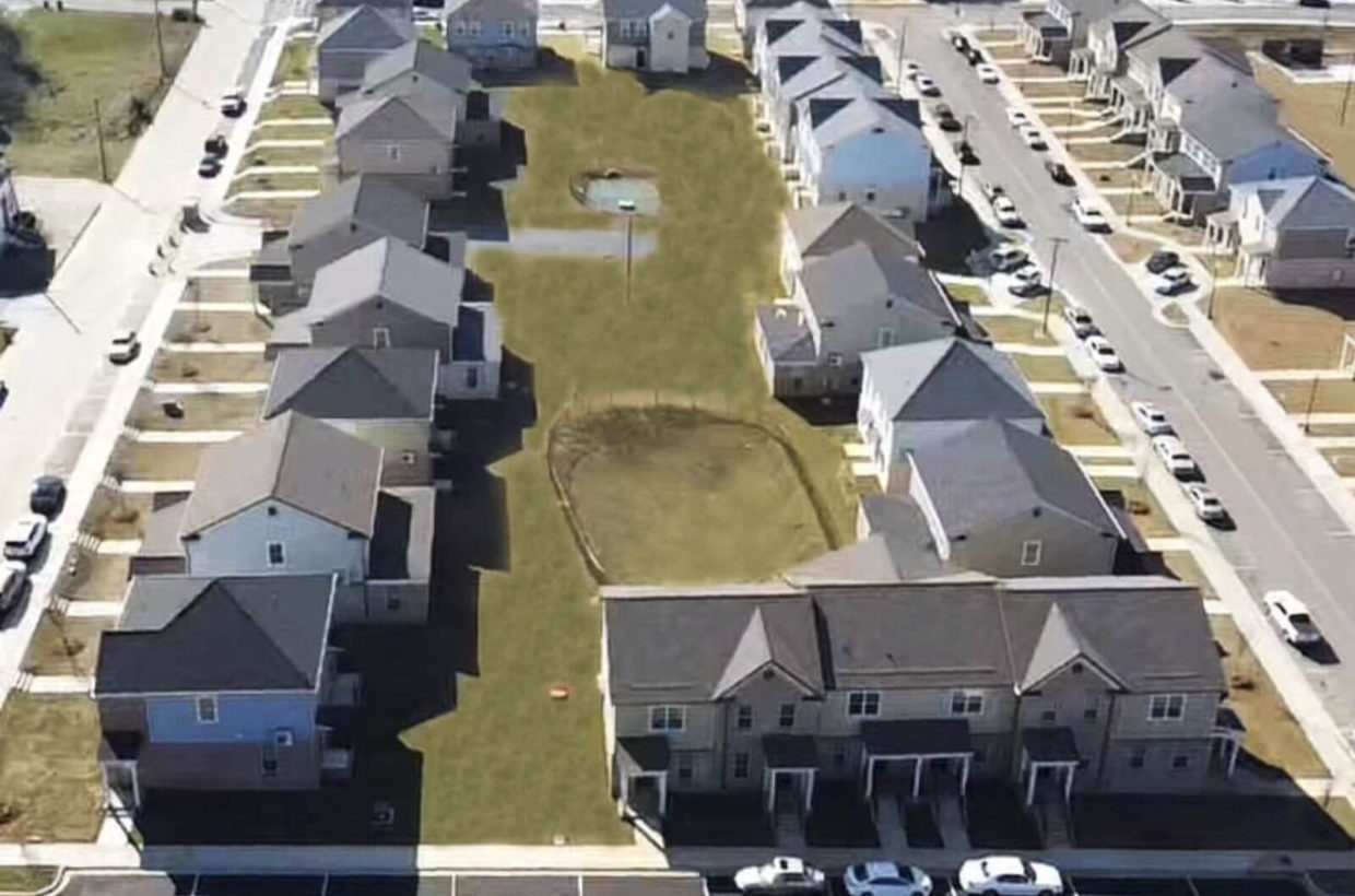 Drone view of a suburban street.